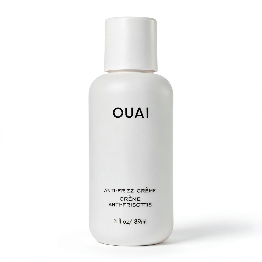 OUAI Anti Frizz Crème being applied to wet hair